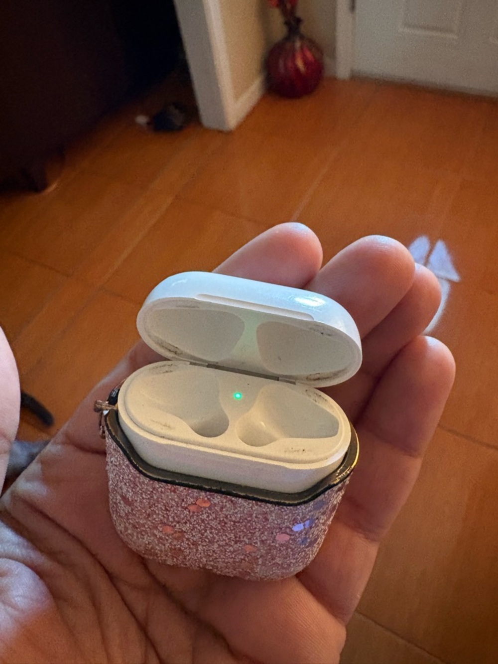 Apple White AirPods Charging Case with Pink Glitter Cover